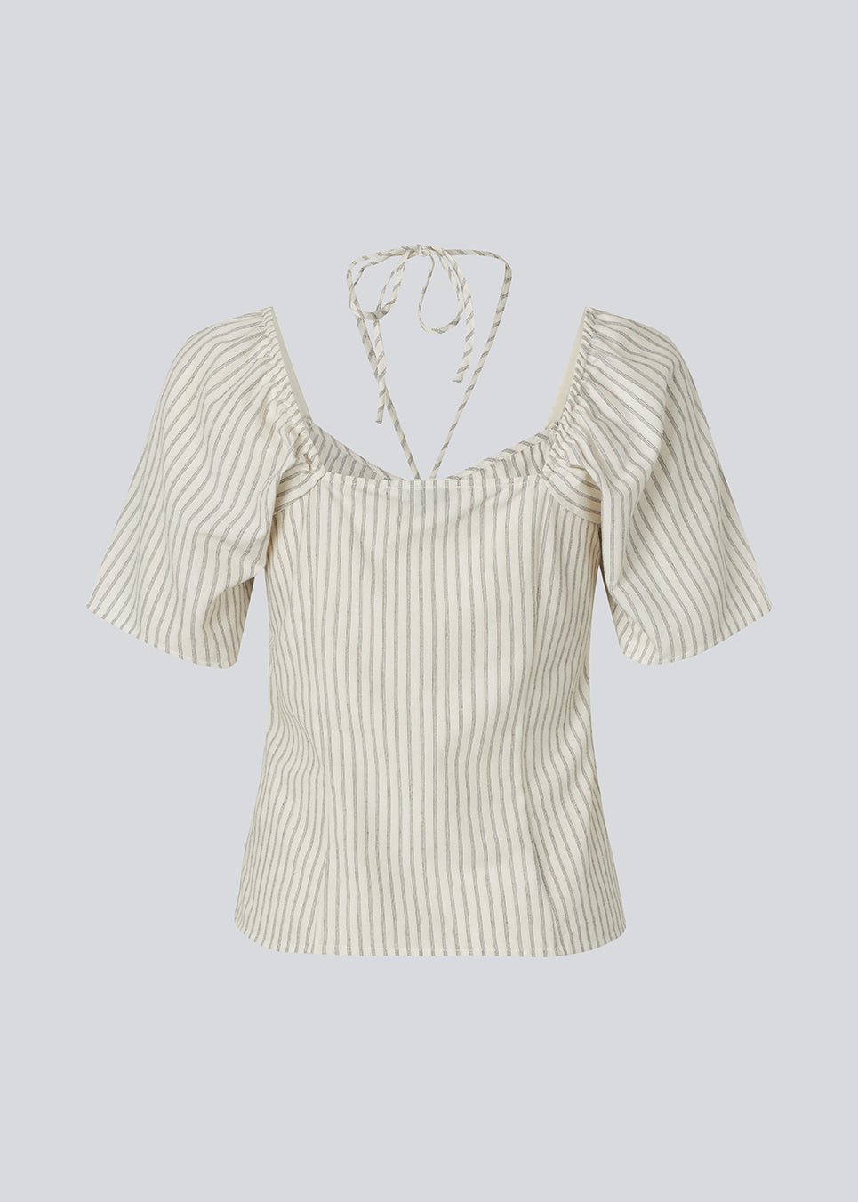 Short-sleeved top with tiedetails in 100% organic cotton. NanikaMD top has a tieband which wraps around the neck, an elastic silicone tape at the
