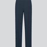 Classic navy pants in navy blue with pressfolds and straight legs. Nelli pants are closed by a hidden zipper at the side with an elastic waistband for a more comfortable fit.