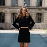 Cropped blazer in a structured material. FaiMD blazer is collarless and has fabric-covered buttons in front and long, slim sleeves. Lined. Style with matching skirt: FaiMD skirt.