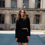 Cropped blazer in a structured material. FaiMD blazer is collarless and has fabric-covered buttons in front and long, slim sleeves. Lined. Style with matching skirt: FaiMD skirt.