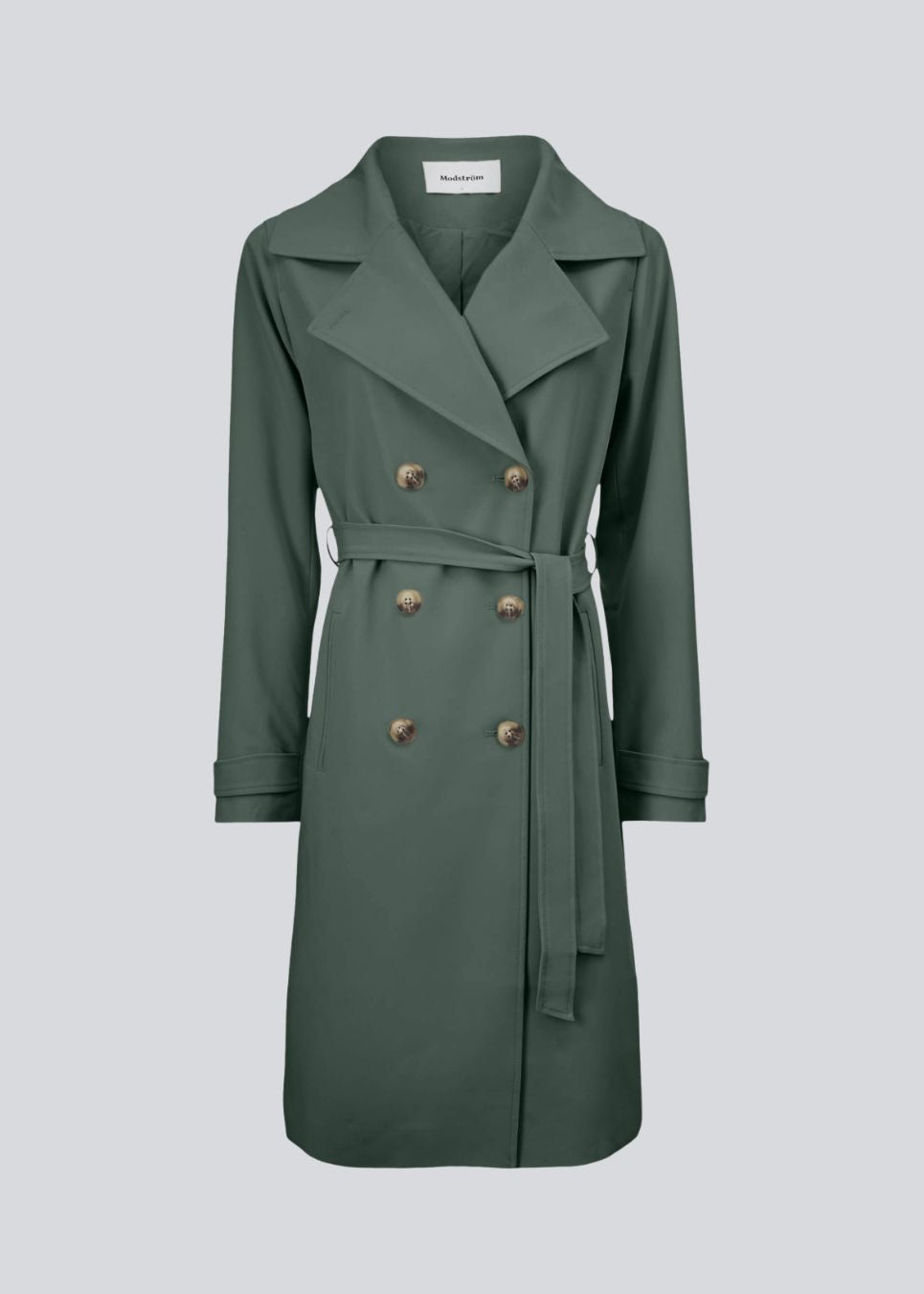 Trenchcoat jacket in green with a classic look and wide revers, a belted waist, and button closure. Hiro jacket is the perfect transition jacket. This jacket has a spacious fit.&nbsp;