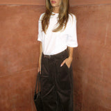 Suit trousers with pleats in corduroy. Pablomd wide pants has long wide legs with side pockets.