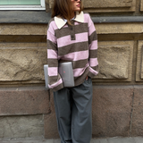 Soft knit polo with an oversized look. Pelhammd stripe polo has long wide sleeves and a shirt collar with a placket closure. Josefine Vogt is 165 cm tall and is wearing a size small.
