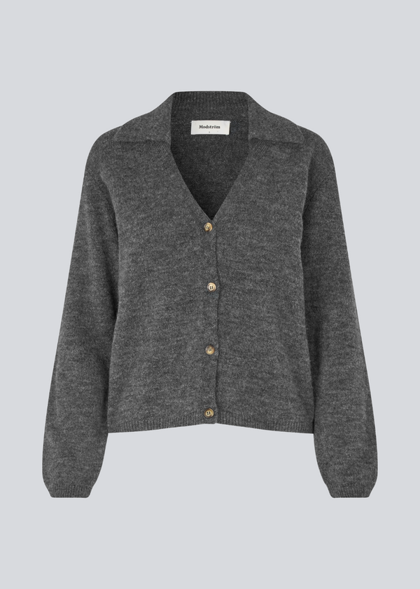 Grey soft knitted cardigan with a V-neck. Patrickmd cardigan has a loose fit and a collar.