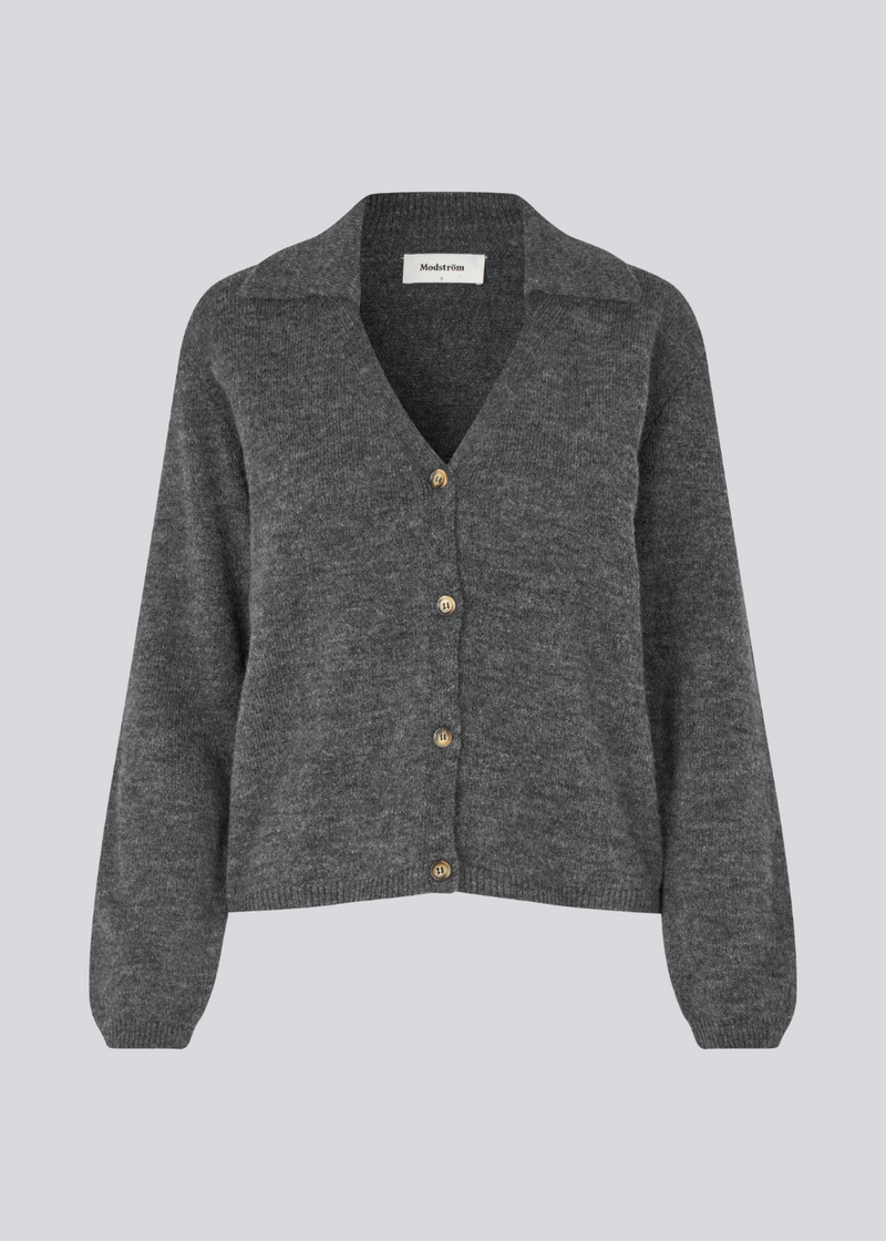 Grey soft knitted cardigan with a V-neck. Patrickmd cardigan has a loose fit and a collar.