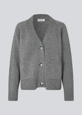 Grey knitted V-neck cardigan in 100% wool. Petunamd cardigan has long wide sleeves and two front pockets.