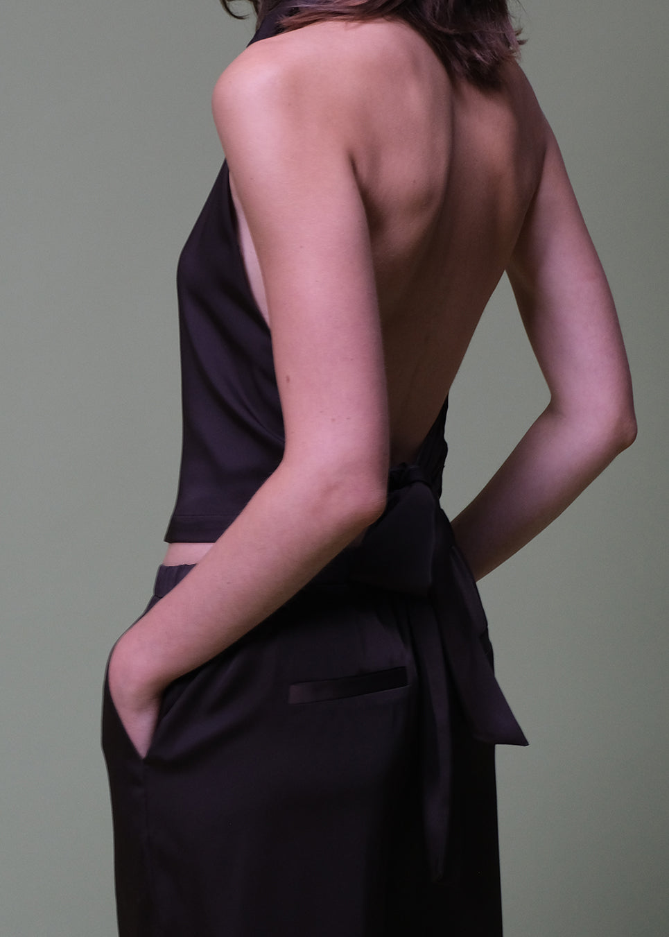 Brown elegant halterneck top. Timmiemd top is made from satin with a flattering open back, tie detail, and high neck. Elegant and perfect for festive occasions.