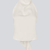 Halternecktop with a tiedetail in satin. Timmiemd top has an open back and a button closure at the neck.&nbsp;