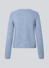 Light blue fitted cardigan in soft knit. The TreeMD cardigan features a round neckline and delicate buttons in a matching color, highlighting its simple and feminine expression.