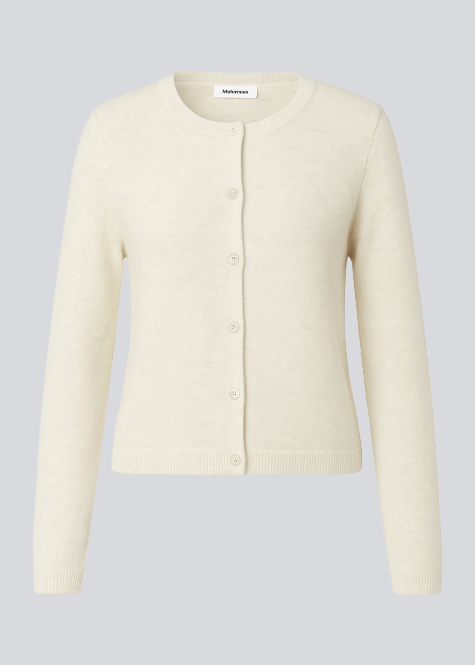 Fitted cardigan in soft knit. The TreeMD cardigan features a high collar and a front zipper – simple, functional, and easy to wear.
