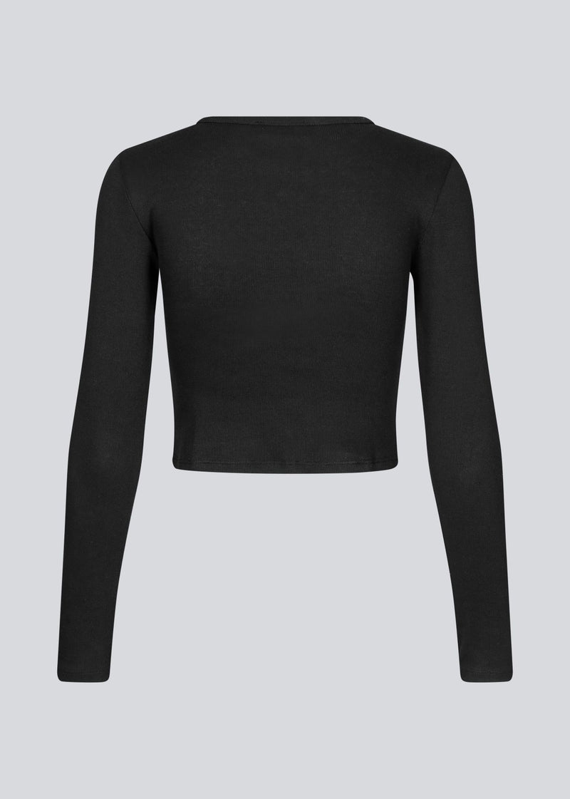 Soft basic crop top in black in soft cotton rib with stretch. IgorMD LS crop top has a tight, cropped fit with long sleeves.