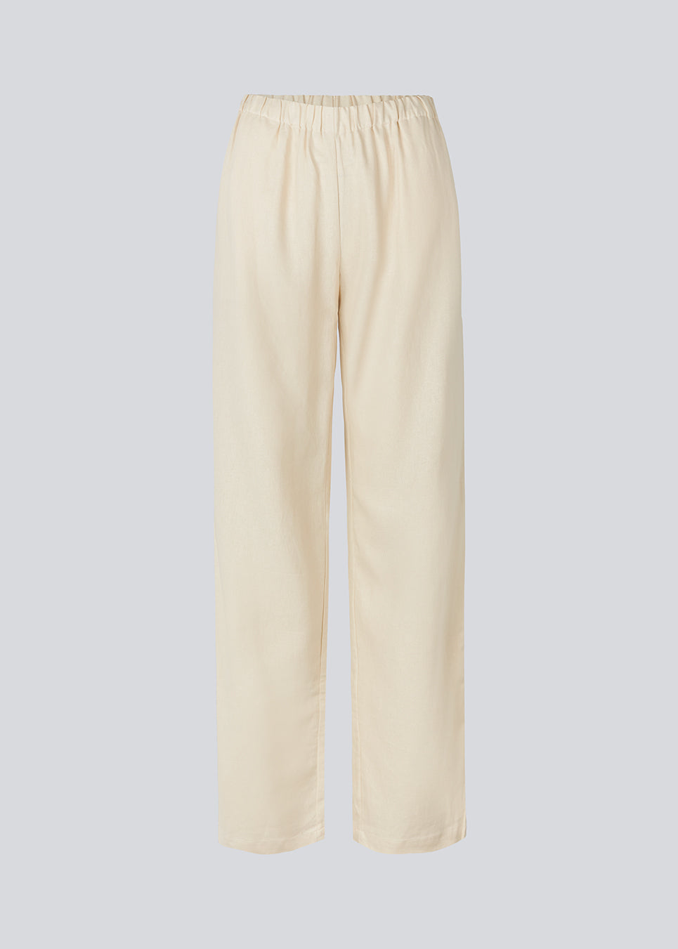 Long pants in beige with a relaxed fit and long wide legs and an elasticated waist for extra comfort. TulsiMD pants are made from a soft mix of linen and rayon. 