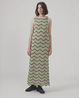 Long sleeveless dress in a multicolored organic cotton crochet. CaryMD dress has detailed trimmings and a deep v-neckline in the back. The model is 177 cm and wears a size S/36.