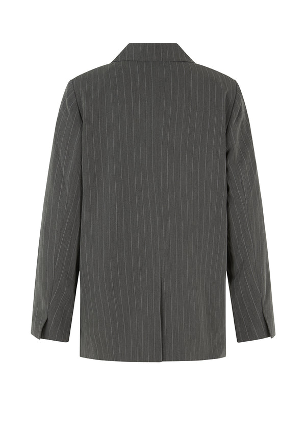 Double-breasted blazer with collar and notch lapels. AbrahamMD blazer has two buttons in front, decorative paspel chest pockets, two front pockets, slits at cuff and vent in back.