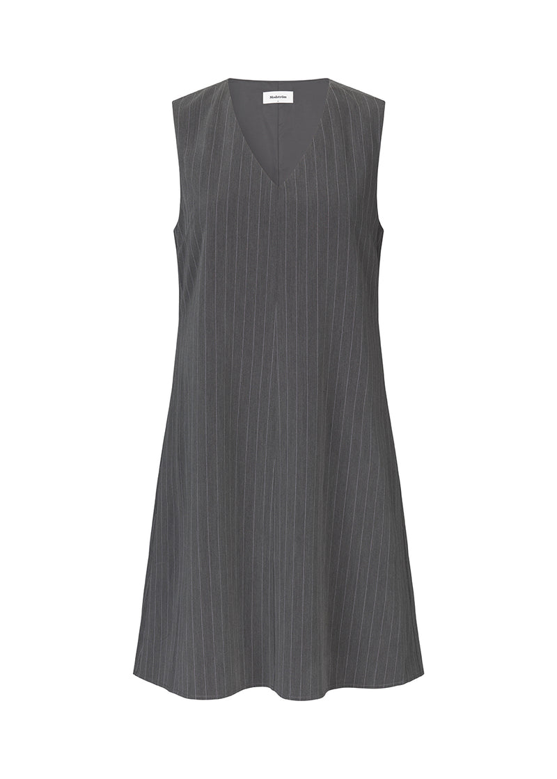 Short pinstriped dress without sleeves and with a deep v-neckline in front. AbrahamMD dress has an A-lined silhouette with skirt that cuts at the knees.