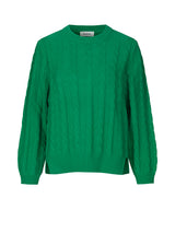 Cable-knitted jumper in green in a soft wool and cotton mix. AliceMD o-neck is designed with a round neck and long sleeves with rib-knit along the neckline, cuffs and hem. The fit is casual.