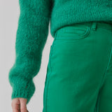 Jeans in green in a dyed organic cotton denim. AmeliaMD jeans have a high waist, five pockets and straight, wide legs. Zip fly and button.