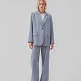 Oversized blazer in the color Dusk with a drapy fit. AnkerMD blazer has collar and notch lapels with a single button closure. Flap welt front pockets. Slits on cuffs and single back vent. Lined.  Shop matching pants: AnkerMD slit pants, or AnkerMD pants