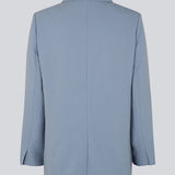 Oversized blazer in the color Dusk with a drapy fit. AnkerMD blazer has collar and notch lapels with a single button closure. Flap welt front pockets. Slits on cuffs and single back vent. Lined.  Shop matching pants: AnkerMD slit pants, or AnkerMD pants