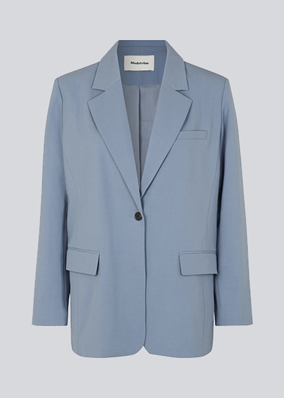 Oversized blazer in the color Dusk with a drapy fit. AnkerMD blazer has collar and notch lapels with a single button closure. Flap welt front pockets. Slits on cuffs and single back vent. Lined.  Shop matching pants: AnkerMD slit pants, or AnkerMD pants