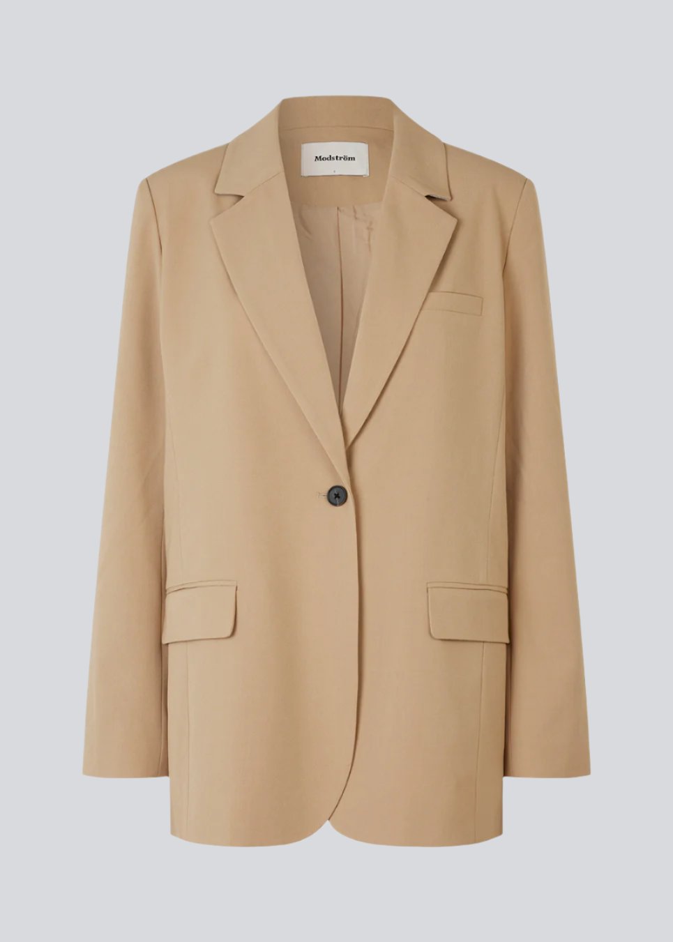 Oversized blazer with a drapey fit. AnkerMD blazer has collar and notch lapels with single-button closure. Flap welt front pockets. Slits on cuffs and single back vent. Lined.  Buy matching pants or a skirt: AnkerMD pants, AnkerMD wide pants, or AnkerMD skirt, in the same color to complete the look.