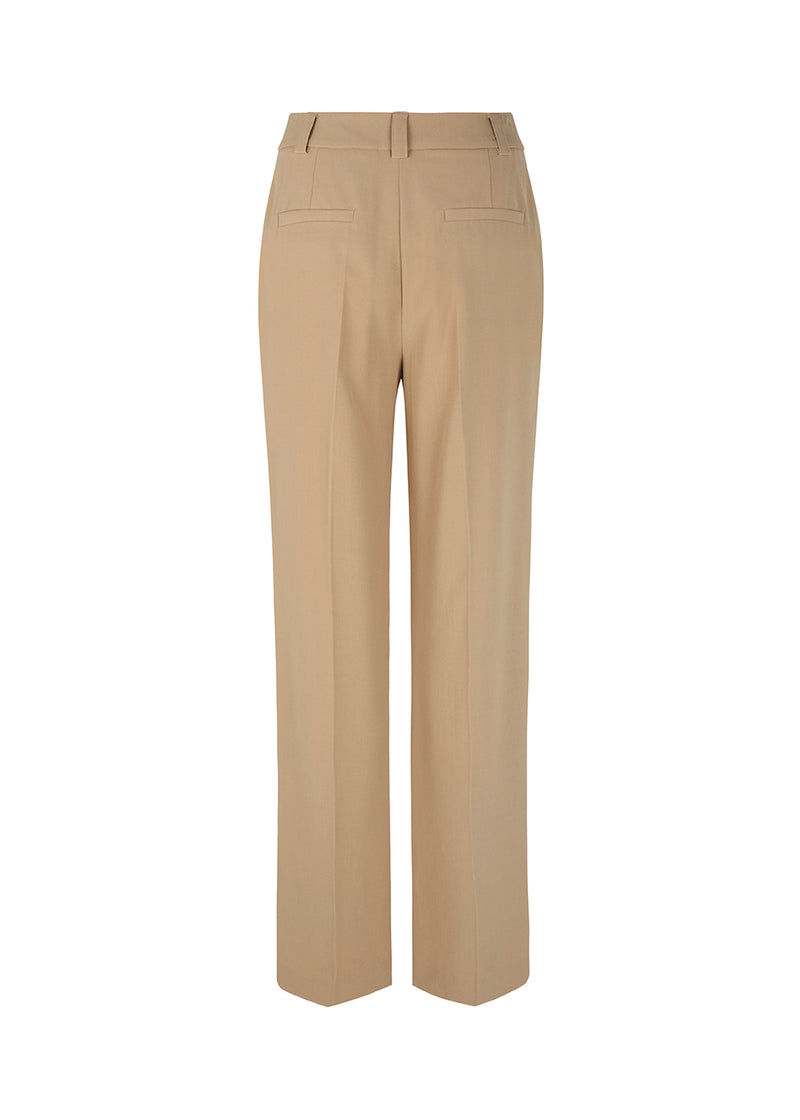 Pants in beige with wide legs and a medium waist. AnkerMD pants have creases, button and zip fly, side pockets and paspel back pockets.  Buy a matching blazer: AnkerMD blazer, in the same color to complete the look.