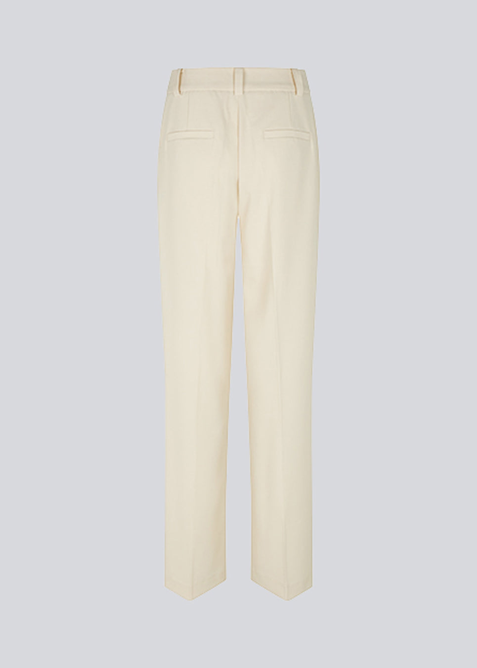 Pants in beige with wide legs and a medium waist. AnkerMD pants have creases, button and zip fly, side pockets, and paspel back pockets. The model is 177 cm and wears a size S/36.  Shop matching blazer: AnkerMD blazer.