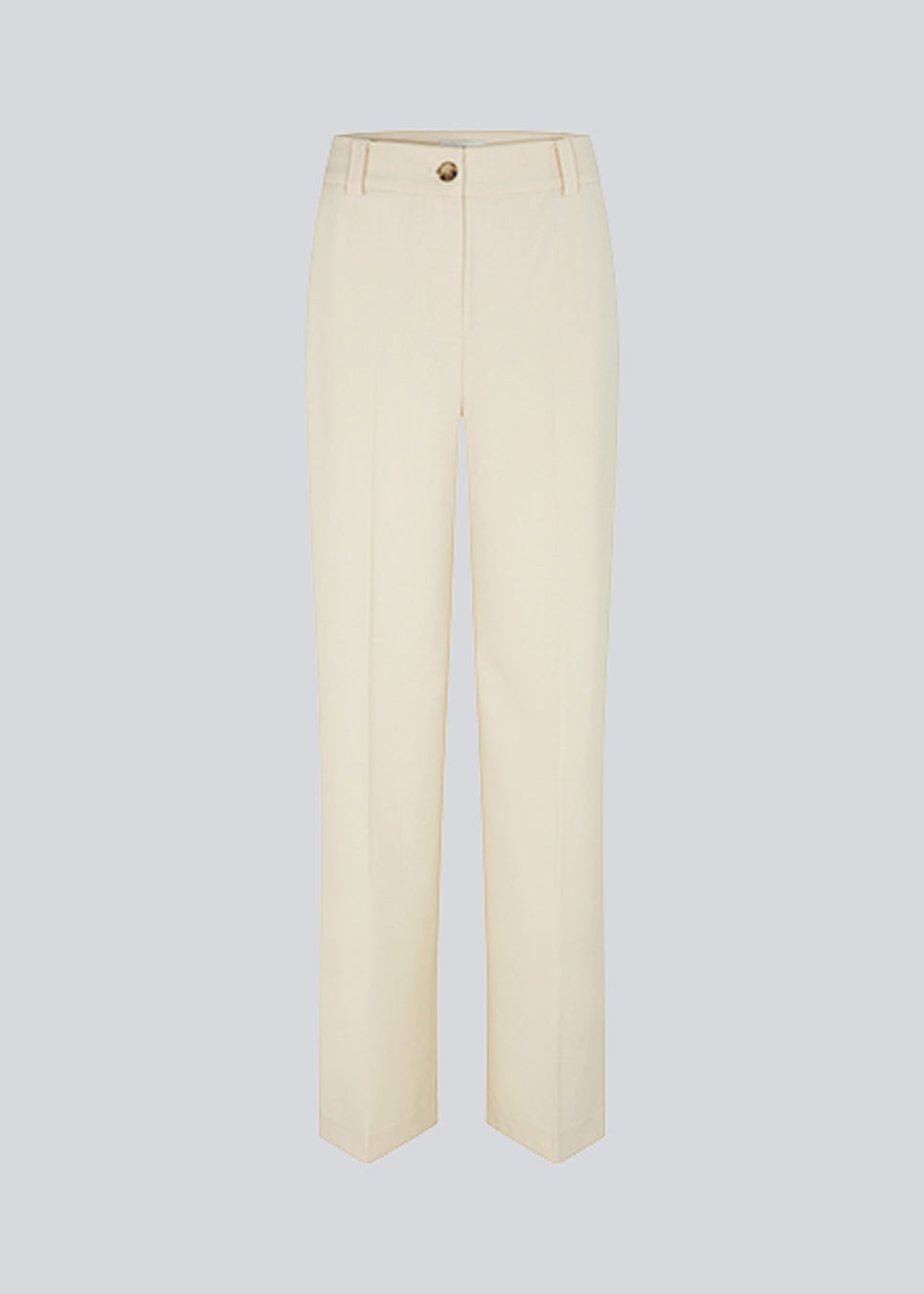 Pants in beige with wide legs and a medium waist. AnkerMD pants have creases, button and zip fly, side pockets, and paspel back pockets. The model is 177 cm and wears a size S/36.  Shop matching blazer: AnkerMD blazer.