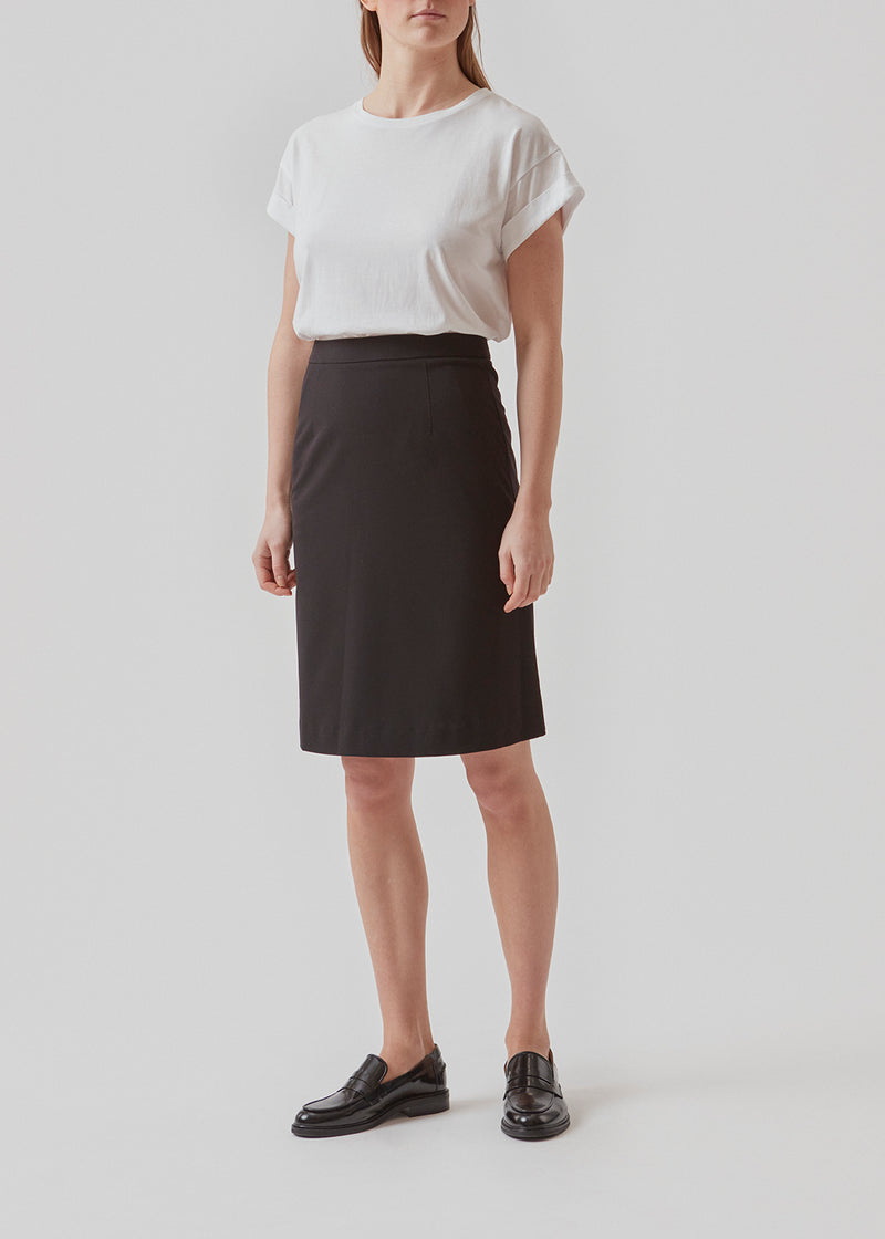 Knee-length skirt with a high waist and a hidden zipper in the back. The silhouette of AnkerMD skirt is A-shaped.  Buy matching blazer: AnkerMD blazer, in the same color to complete the look. 