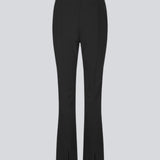 Pants in a slim silhouette with hidden closure at one side. AnkerMD slit pants have decorative paspel back pockets, sewn-in creases, and slits at hems.  Buy matching blazer: AnkerMD blazer, in the same color to complete the look. 