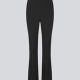 Pants in a slim silhouette with hidden closure at one side. AnkerMD slit pants have decorative paspel back pockets, sewn-in creases, and slits at hems.  Buy matching blazer: AnkerMD blazer, in the same color to complete the look. 
