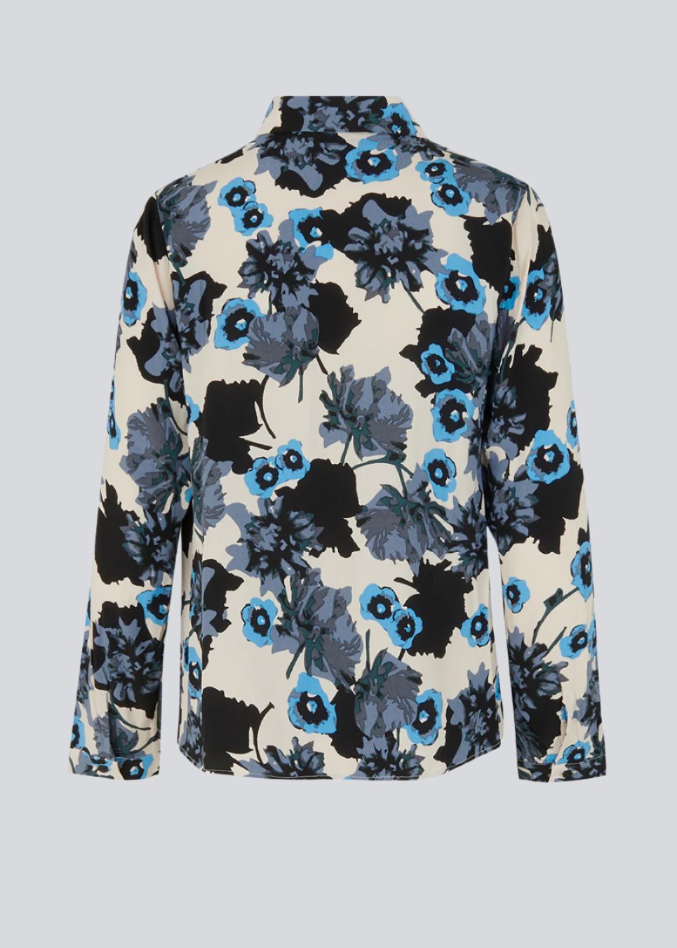 Shirt with large floral print in EcoVero viscose. AnnalieMD print shirt has a relaxed shape with long sleeves, collar and button closure in front.
