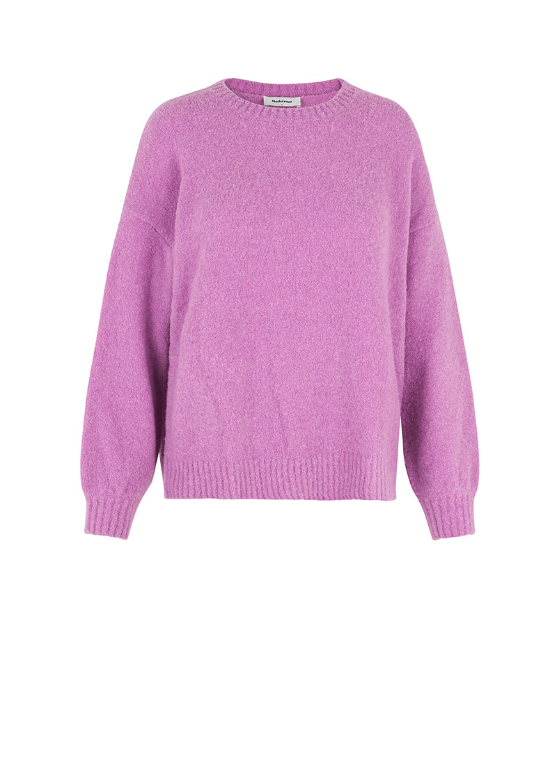 AntMD o-neck in purple has a relaxed fit with dropped shoulders and long sleeves with a tight-fitting, ribbed cuff. Crafted from a soft wool quality.