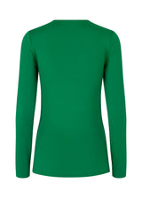 Long sleeved top in green with a formfitted shape and in a stretchy material. ArniMD top has a high v-neckline with a wrap-effect in front.