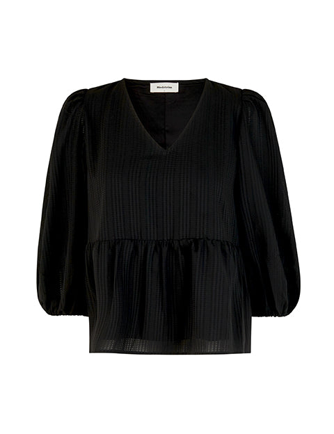 Top in black in a loose silhouette with 3/4 length sleeves, v-shaped neckline and a cutline at the waist for extra volume on the bottom of the top.  Material: 100% Polyester