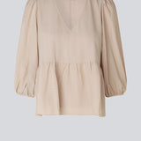 Top in beige in a loose silhouette with 3/4 length sleeves, v-shaped neckline and a cutline at the waist for ekstra volume on the bottom of the top.