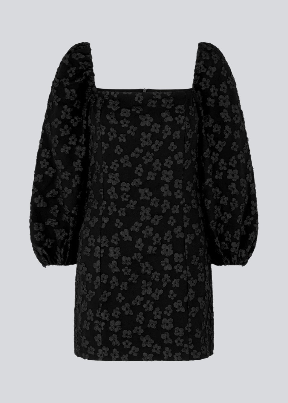 Short dress in black with all-over floral structure. AtiraMD dress has long balloon sleeves and a more fitted body. The neckline is square in front and back.