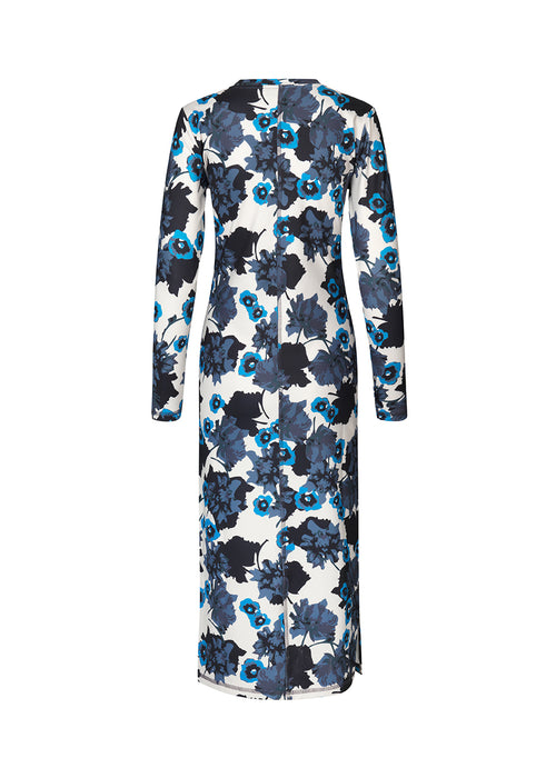 Form-fitting dress with long sleeves and round neck. AustinMD print dress has a decorative vertical stich in front and back.