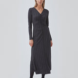Tight dress in the color: Love Love Blue stretchable quality with print and A shape.BartoMD dress has long sleeves and V-neckline with wrinkle detail at the waist.
