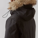 Technical jacket with natural down filling. The BaseMD jacket has adjustable hood with fauw fur piping and big pocket in front and piped pockets by the chest. The style has long sleeves with ribbed cuffs. 