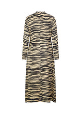 Midi dress with an A-line silhouette in a recycled quality, BeckyMD print dress has a low collar and a concealed zip at the back of the neck. Long sleeves and cutline at the waist with a high slit in front. Lined.