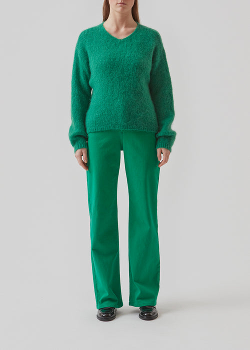 Easy knitted jumper in a soft mohair quality. BertyMD v-neck has a v-neckline and long sleeves with dropped shoulders. The shirt is slightly see-through.