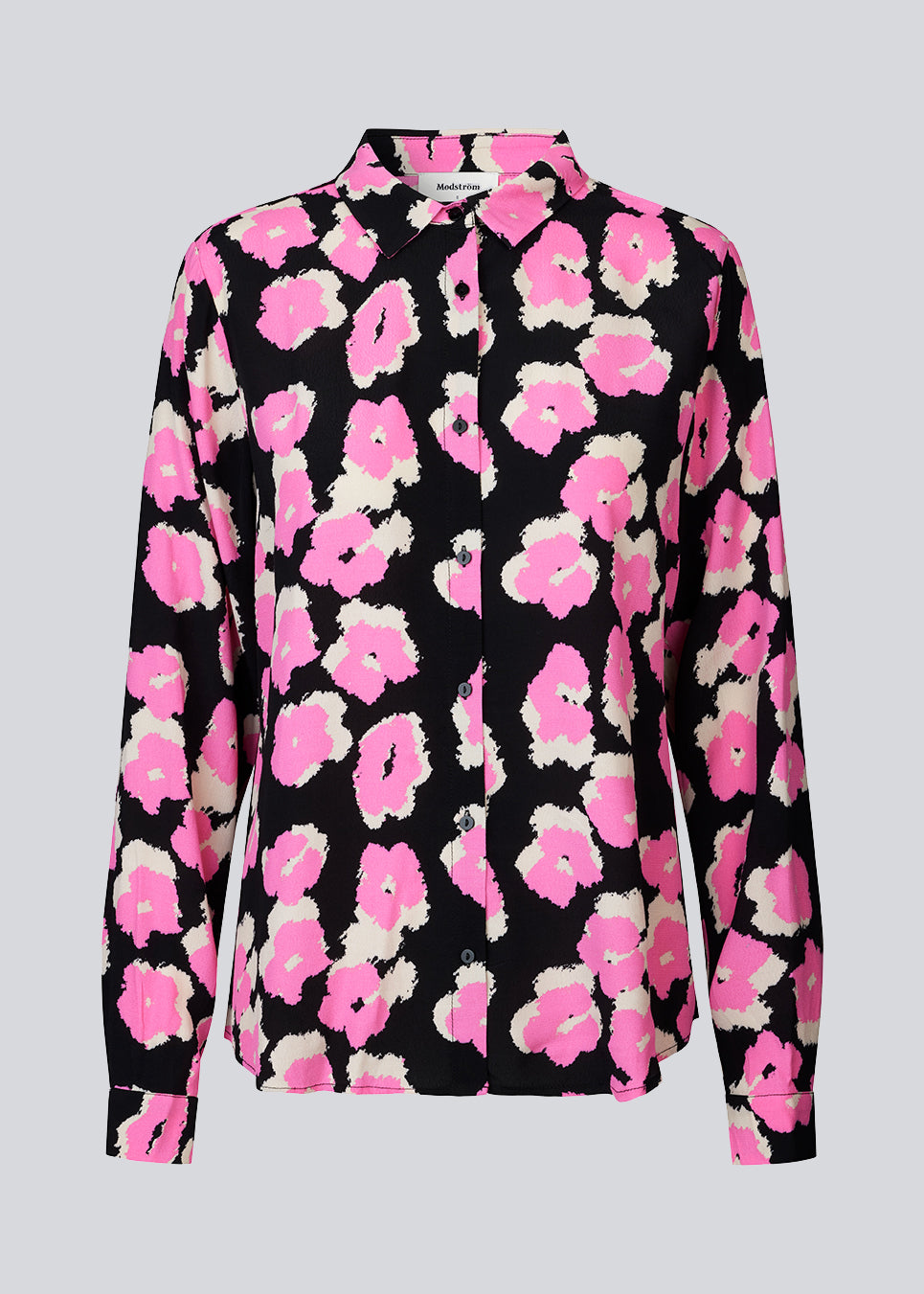 Shirt in a more responsible woven quality with collar, button closure in front, and long sleeves with a wide cuff. BibbieMD print shirt has a relaxed fit with a soft drape.