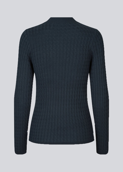Cable-knitted jumper in dark blue with a figure-hugging silhouette. BimoMD t-neck has a low collar, long sleeves, and ribknitted trimmings.