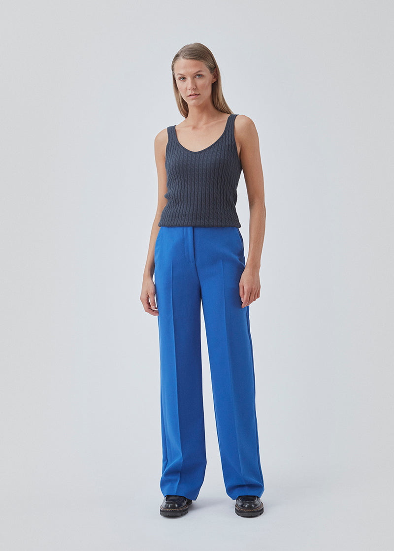 Straight-fitting cardigan in fine cable knit. BimoMD top has a deep neckline in front and back with wide straps. Slim ribbed trimmings.