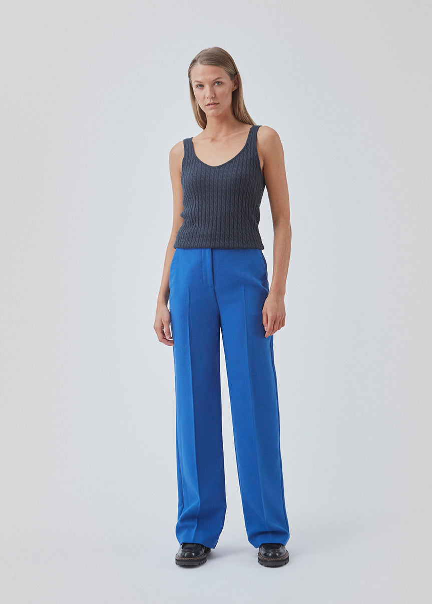 Straight-fitting cardigan in fine cable knit. BimoMD top has a deep neckline in front and back with wide straps. Slim ribbed trimmings.