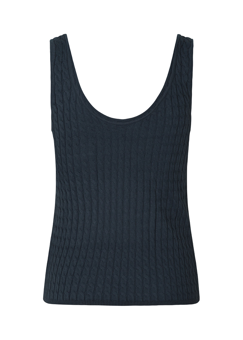 Straight-fitting cardigan in fine cable knit. BimoMD top has a deep neckline in front and back with wide straps. Slim ribbed trimmings.