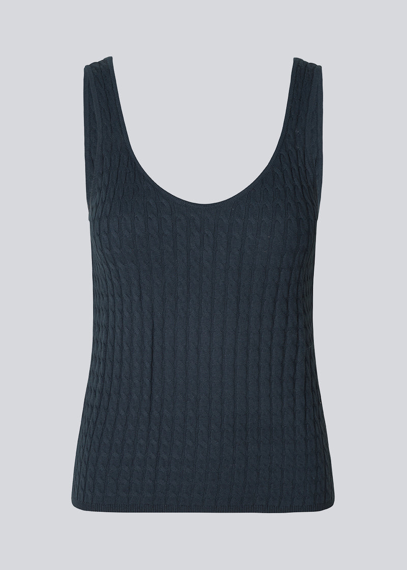 Straight-fitting cardigan in fine cable knit. BimoMD top has a deep neckline in front and back with wide straps. Slim ribbed trimmings.
