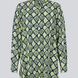 Relaxed, long shirt with a loose-fit silhouette in snake print. CamilaMD print shirt is designed with long sleeves with cuff, collar, and buttons in front. The model is 177 cm and wears a size S/36.
