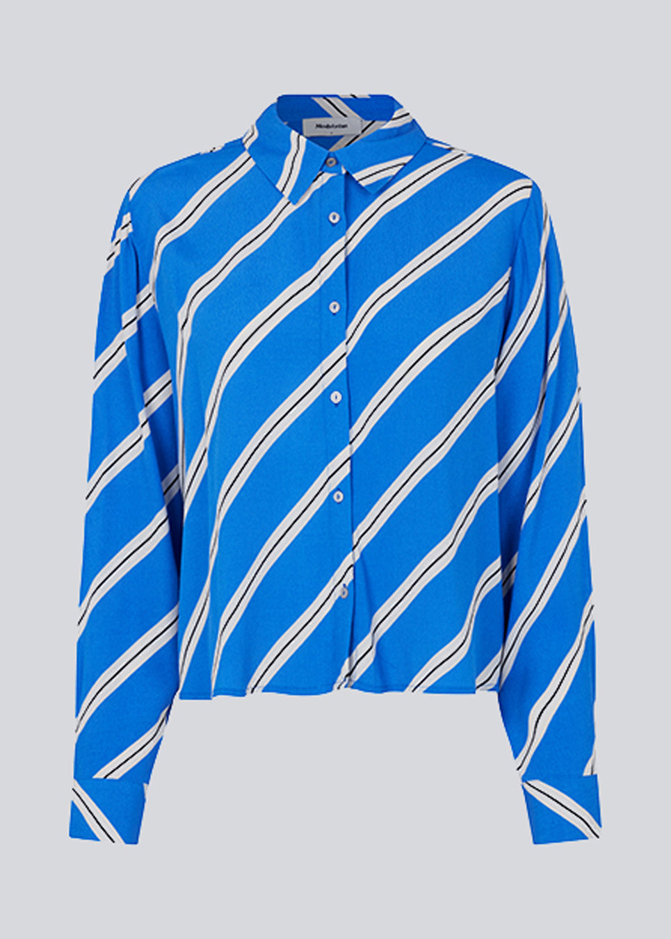 Easy shirt with a loose silhouette. CenniMD print shirt is crafted from an EcoVero viscose quality with diagonal stripes. The model is 177 cm and wears a size S/36.  Match with CenniMD print pants to complete the look.  Material: